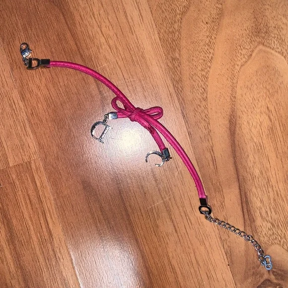 Authentic Christian Dior Leather and Metal Charm Bow Bracelet - Picture 7 of 11